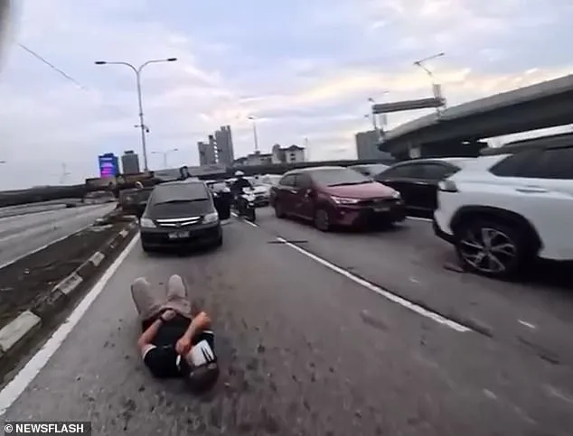Toddler's Door Yank on Malaysia Motorway Causes Chain Reaction, Injuring Two Motorcyclists and Prompting Police Probe