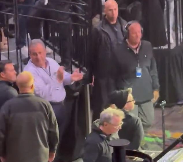 Springsteen walks past Christie at concert, sparking viral snub rumors.